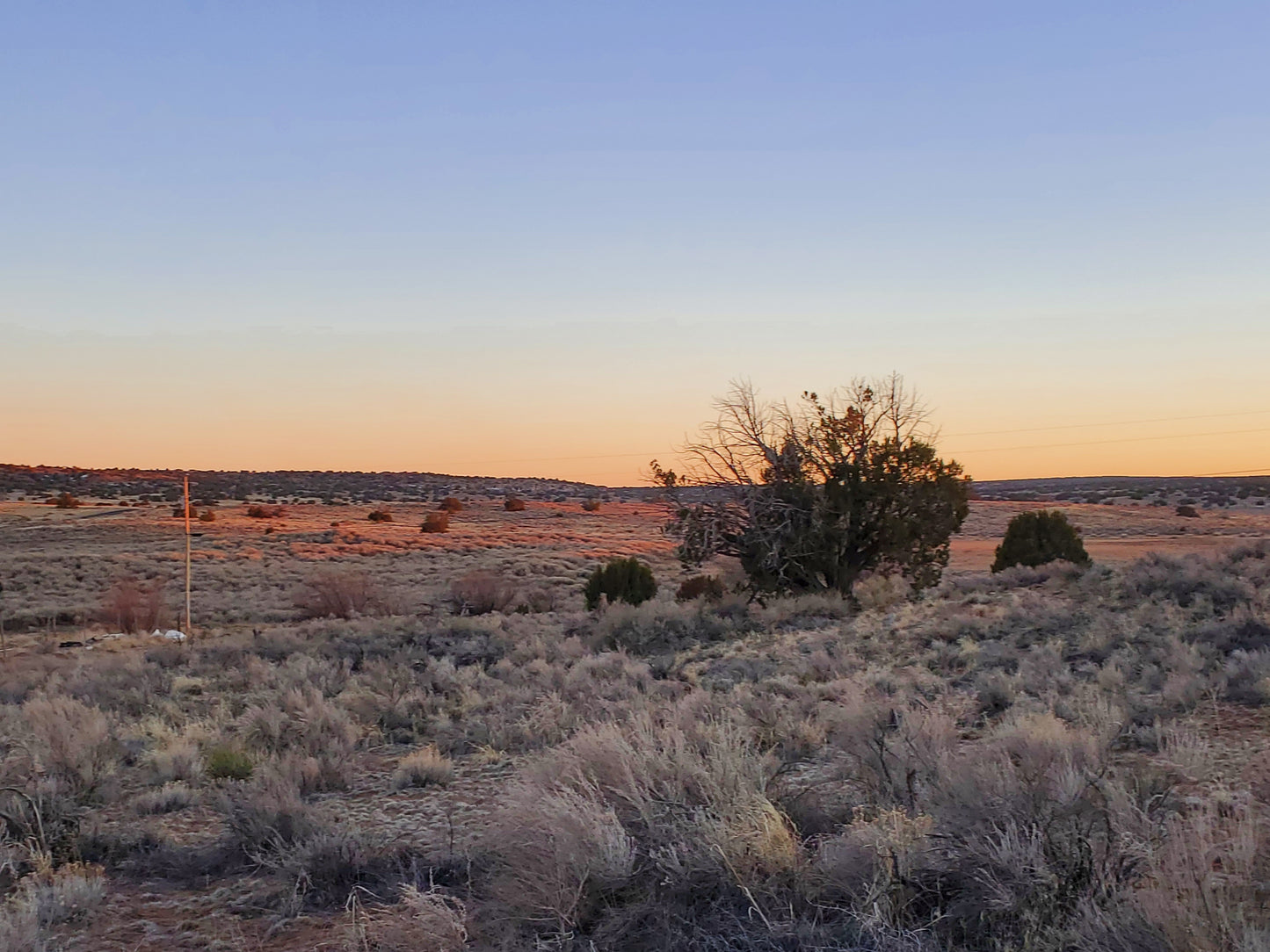 Picture-perfect land showcasing the beauty of distant mountain ranges.